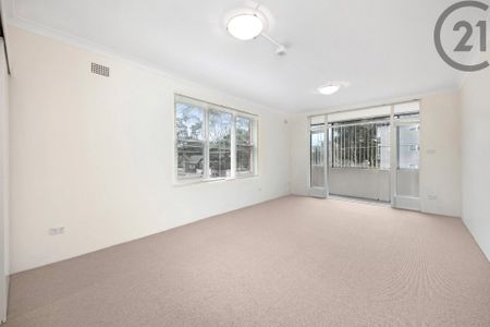 Large&comma; Sunfilled Apartment&comma; Sunroom&comma; Lock up Garage and Exceptional Value&period; - Photo 5