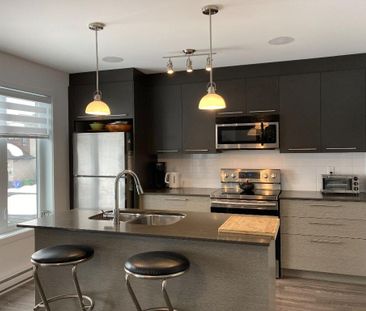 Condo de 2 chambres et une salle de bain - Photo 1