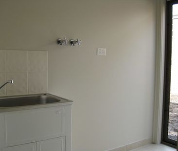 Modern 3-Bedroom Home in a Convenient Location - Photo 4