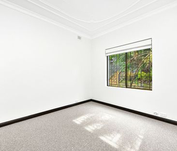 RENOVATED LOWER LEVEL DUPLEX WITH LOCK UP GARAGE - Photo 3