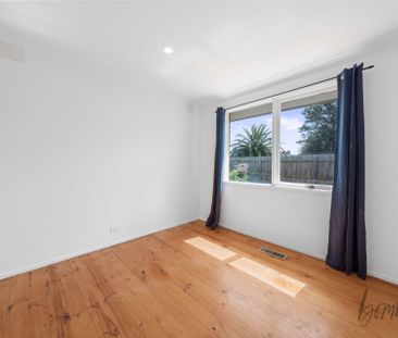 Spacious & Sunlit Living - Photo 4