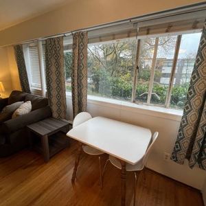 Charming 2-Bedroom Furnished Suite Steps from Kits Beach! - Photo 2