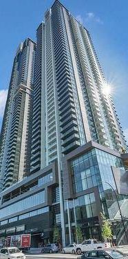 Brand New 1 Bedroom + Den Highrise Apartment Unit for Rent - Photo 1