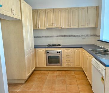 Freshly painted & Spacious 1-Bedroom Apartment with Study Nook & La... - Photo 4