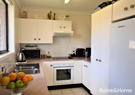 Neat and Inviting Home with Enclosed Carport - Photo 4