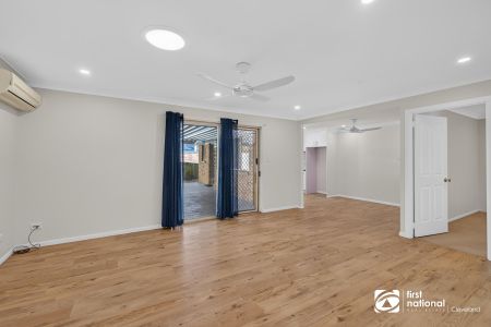STUNNING FAMILY HOME WHICH SHOWCASES SUMMER LIVING AT ITS FINEST - POOL ! SPACE ! ...AND FAMILY COMFORT IN BEAUTIFUL WELLINGTON POINT - Photo 4