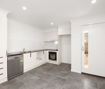 Modern Three-Bedroom Home in Convenient Redbank Plains Location - Photo 4