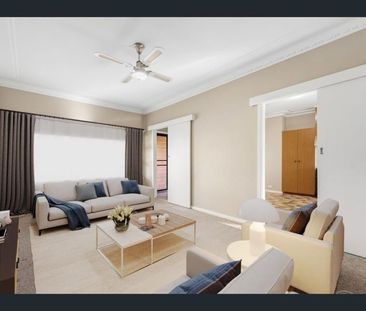 Generous Family Home with Poolside Entertaining in Prime Location - Photo 1