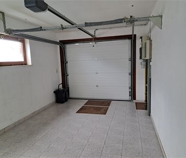 Een vrijstaande woning met tuin en inpandige garage - Photo 6