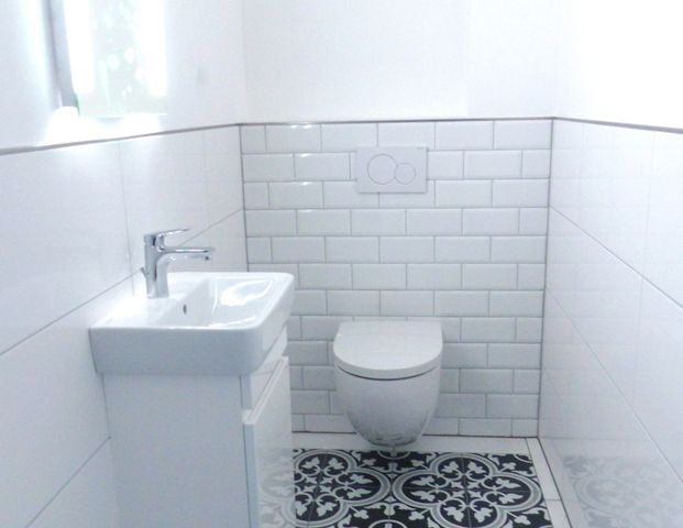 Erstbezug, moderne Obergeschosswohnung mit Balkon und Carport in Westoverledingen - Flachsmeer - Foto 1