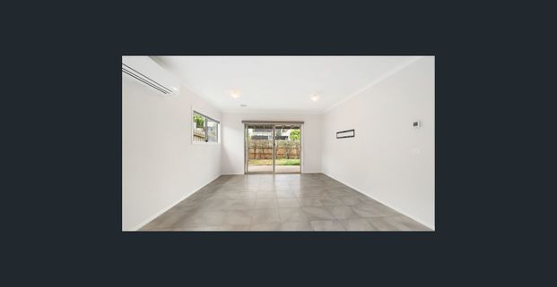 Tucked away from the street, a modern style three bedroom home - Photo 1