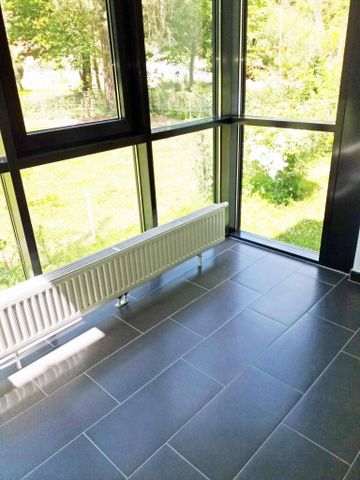 Gemütlich 2-Zimmerwohnung mit Wintergarten und Blick ins Grüne - Photo 5