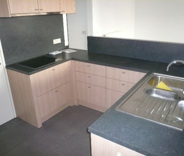 Een centraal gelegen appartement met 3 slaapkamers en terras - Photo 1