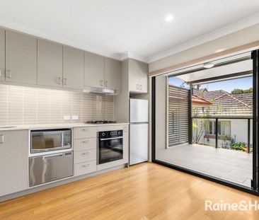 Modern freestanding tri level townhouse with recent upgrades in a b... - Photo 3