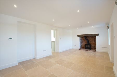 A beautifully refurbished brick and flint cottage combining charming period character with stylish, high-quality finishes throughout. - Photo 3
