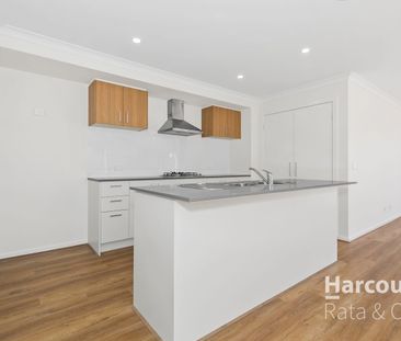 Modern 4-Bedroom Home in the Heart of Beveridge - Photo 4