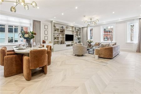 A stunning three-bedroom, three-bathroom duplex penthouse on the prestigious Stratton Street, Mayfair. Set within a distinguished period building. Moments from Green Park, Bond Street, and top dining. - Photo 3