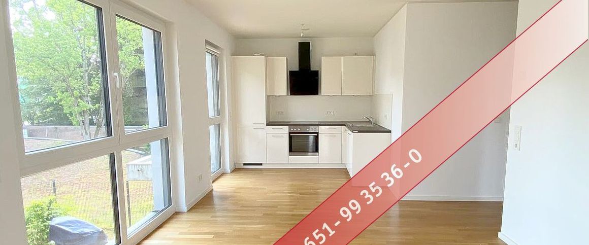 Luxuriös wohnen direkt an der Mosel - Lichtdurchflutete und barrierefreie 2ZKB Wohnung mit Balkon, Einbauküche, Fußbodenheizung und Tiefgaragenstellplatz! - Foto 1