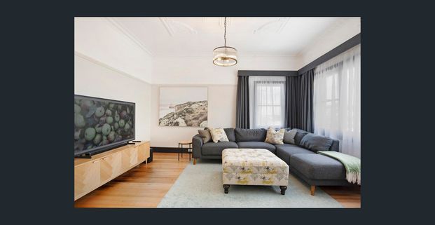 Charming Renovated Home in Central Location - Photo 1