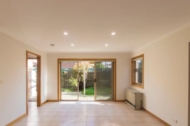 “Unsurpassed Convenience in the heart of Leafy Coburg Awaits” - Photo 1