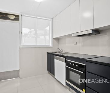 MODERN AND LOW MAINTENANCE UNIT - WATER AND ELECTRICITY INCLUDED - Photo 1