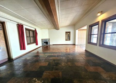“Elevated 2-Bedroom Home with Spacious Sunroom and Large Balc” - Photo 2