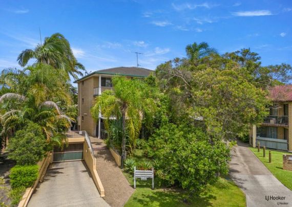 NEWLY RENOVATED TWO BEDROOM TOP FLOOR BEACHSIDE UNIT - Photo 1