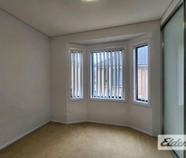 Modern 3-Bedroom Brick Townhouse with Double Lock-Up Garage - Photo 3