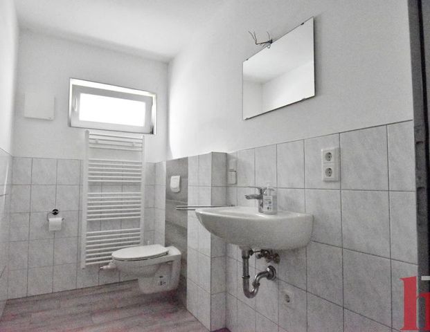 2-Zimmer-Souterrainwohnung in Bramsche - Foto 1