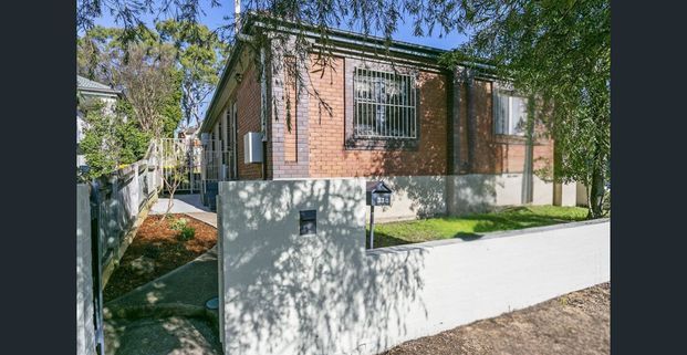 Charming Two-Bedroom Semi in Prime Location - Photo 1