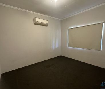 Modern property with a large fenced yard! - Photo 1