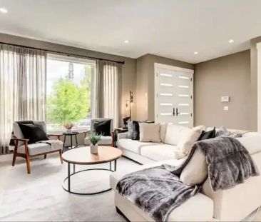 Luxurious 6-bedroom, 3.5-bathroom duplex located in the heart of Renfrew | 1209 Renfrew Drive Northeast, Calgary - Photo 1