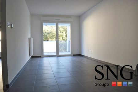 T2 AVEC TERRASSE ET UN PARKNG - Photo 2