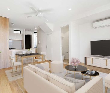 STYLISH DOUBLE-STORY APARTMENT WITH MODERN AMENITIES - Photo 1