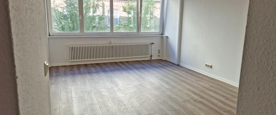 Traumwohnung im 1. OG: Modern, offen und familienfreundlich! - Foto 1