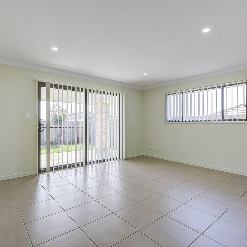 Room for Everyone in This Spacious 4-Bedroom Home - Photo 1