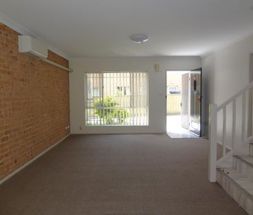 Charming Townhouse with Private Backyard - Photo 1