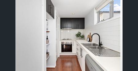 Two Floors, Two Carports, Too Good to Miss! - Photo 5