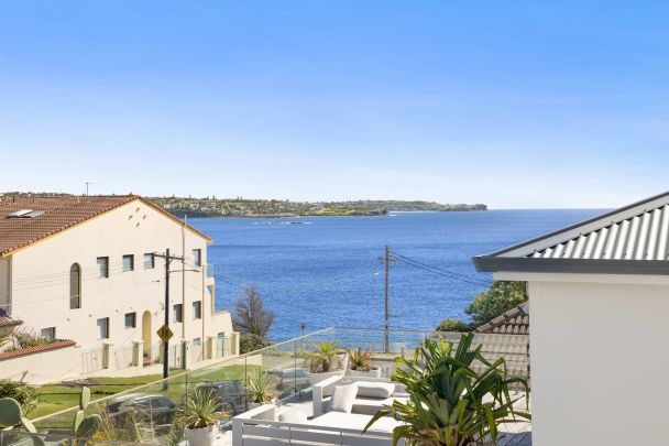 STUNNING COASTAL ARCHITECTURAL ABODE FLOODED IN NATURAL LIGHT - Photo 1