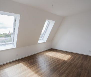 Dachgeschosswohnung mit großzügiger Terrasse - 3 Zimmer auf über 90... - Photo 5