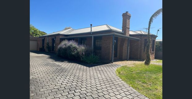 Neat Family Home In Convenient Location - Photo 1