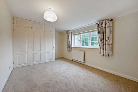 A centrally located three bedroom detached home with off street parking - Photo 3