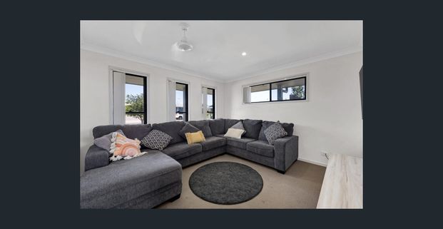 Spacious 4-Bedroom, 2-Living Gem with Solar - Photo 1