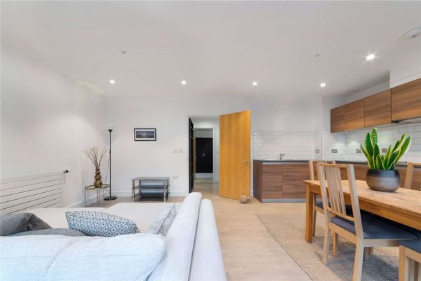 A stunning two bedroom, two bathroom flat located on the first floor of a modern development on Barking Road. - Photo 1