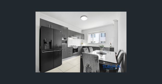 Spacious 2-Bed Retreat with Modern Comforts & Prime Location! - Photo 1