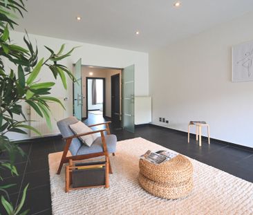 Mooi gelijkvloers appartement met ruime tuin en parking - Photo 4