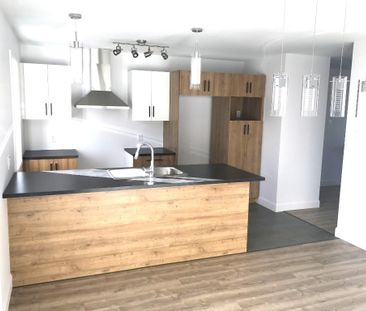 Superbe 5 ½ style CONDO (2019) à Farnham – Thermopompe & 2 Stationn... - Photo 2