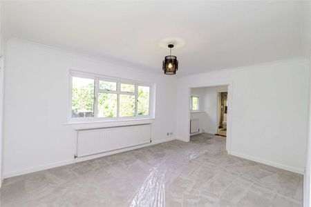 A five bedroom family home arranged over two floors, with a mature south west facing garden and swimming pool. - Photo 4