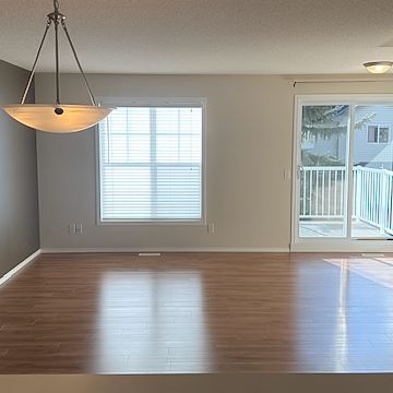 Bright Walkout 2 Bed Townhome With Double Garage In Tuscany - Photo 1