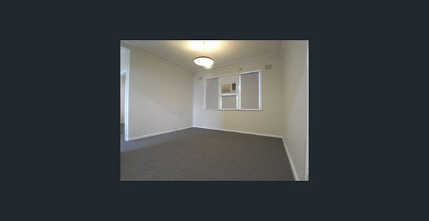 Neat & Tidy 2-Bedroom Unit - Photo 1